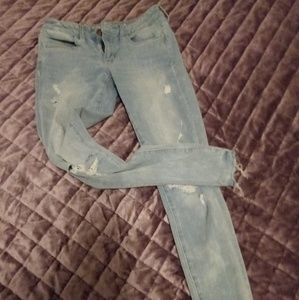 AE super super stretch distressed light wash jeans
